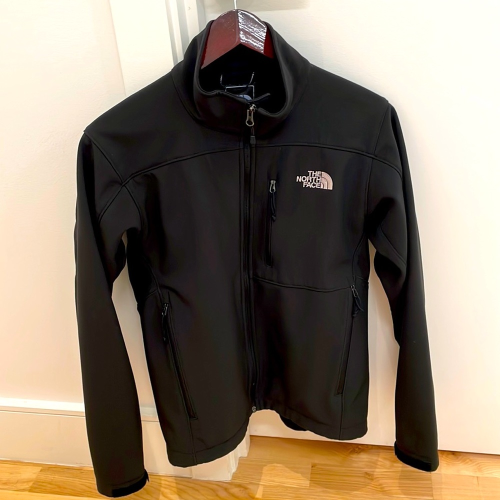 The North Face black zip-up jacket